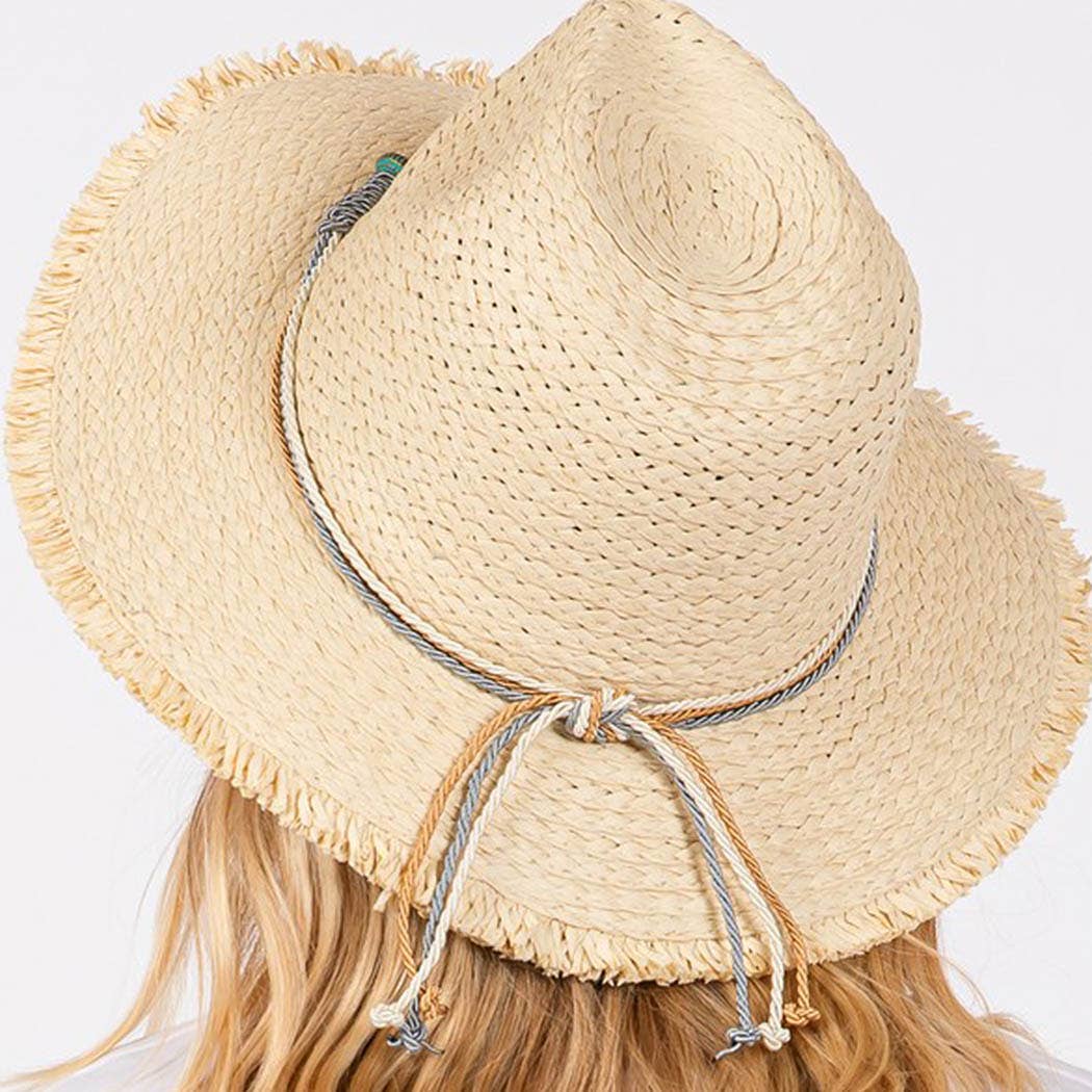 Frayed straw hat with braided starfish