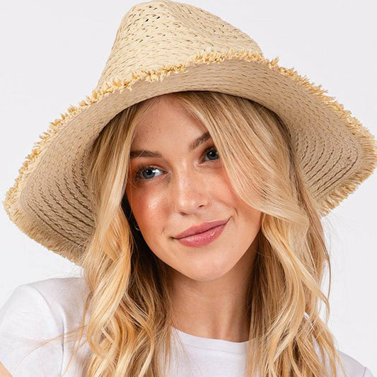 Frayed straw hat with braided starfish