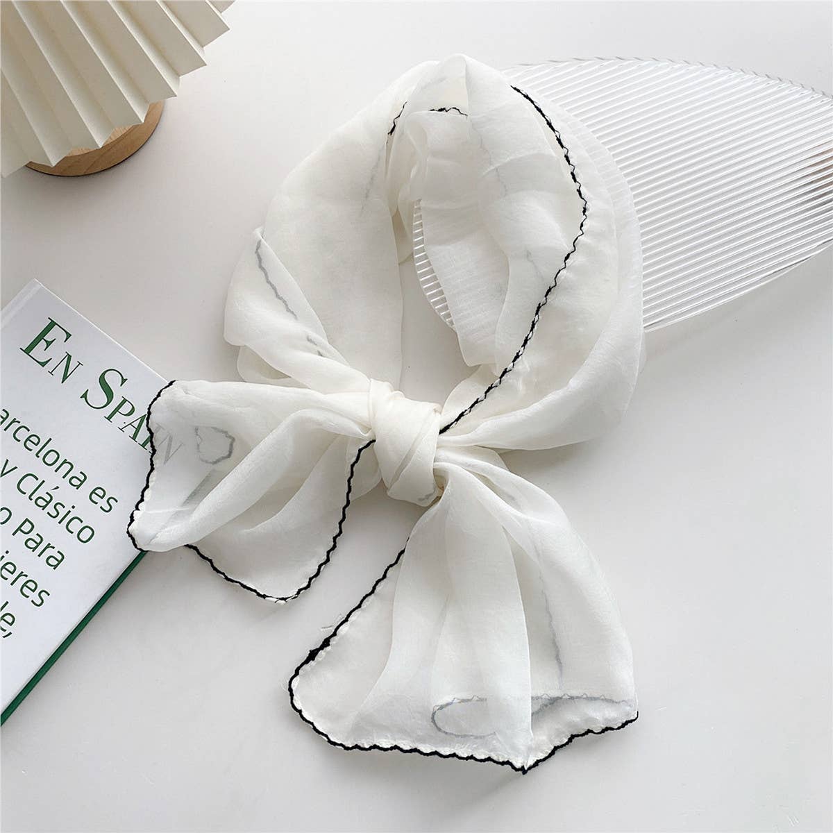 Long solid scarf with beaded edge