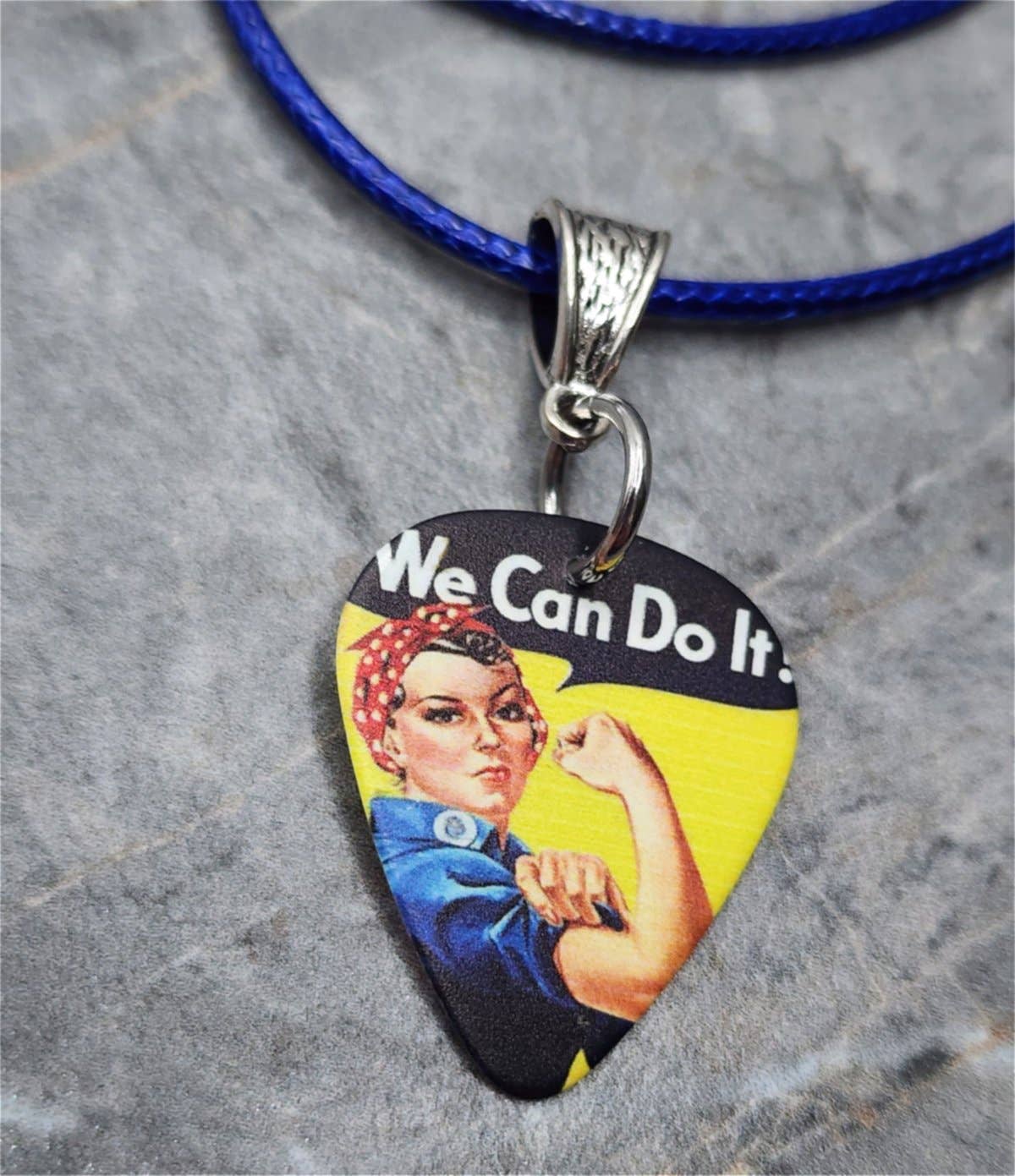 Rosie the Riveter Guitar Pick Necklace with a Blue Cord