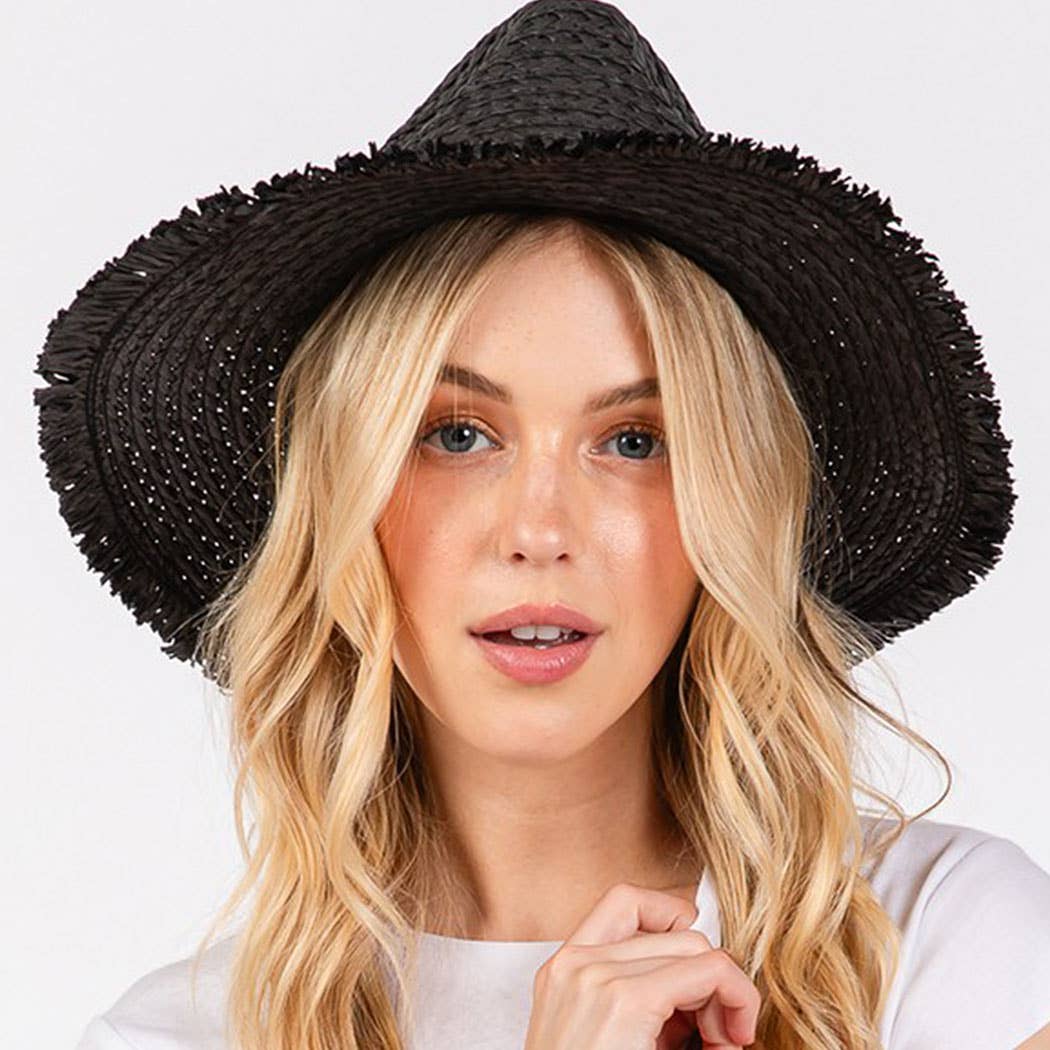 Frayed straw hat with braided starfish